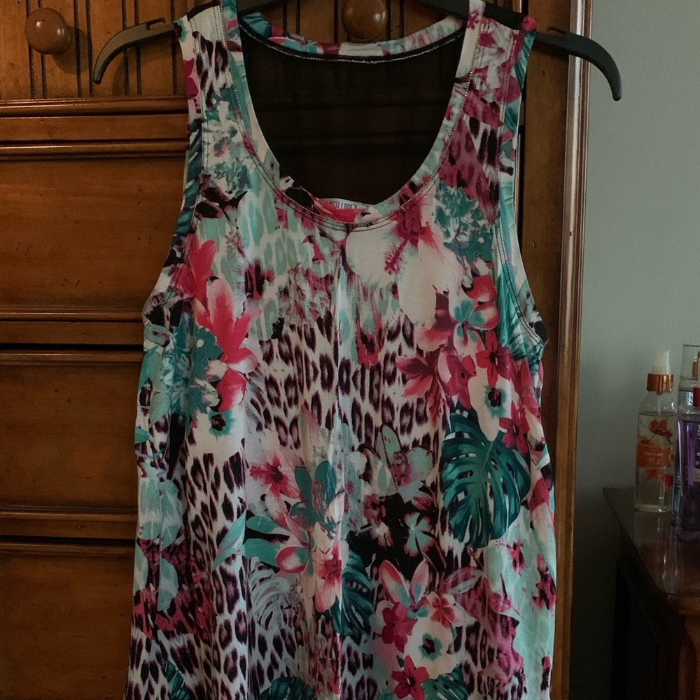 Bright floral/tropical print mesh hem tank.